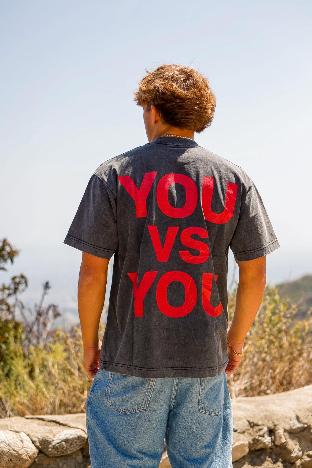 Voidborn charcoal tee with red You Vs You back print outdoors